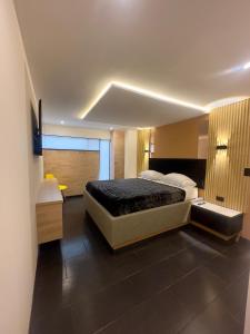 Postel nebo postele na pokoji v ubytování Hotel Biba Life - Chia