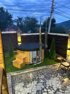 a backyard with a fire pit in the yard at Swiss House Dilijan in Dilijan