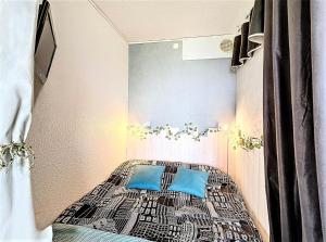 Postel nebo postele na pokoji v ubytování Résidence Vanguard - STUDIO 4 PERSONNES MAE-5933