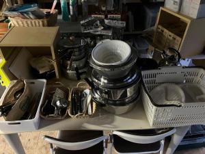 a kitchen counter with dishes and utensils on a table at Kitakaruizawa Donguriyama no Ichibanboshi Campsite - Vacation STAY 31715v in Kita-karuizawa +16 photos
