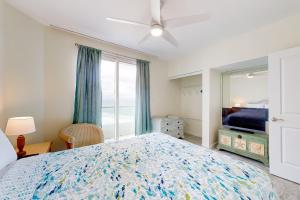 Ένα ή περισσότερα κρεβάτια σε δωμάτιο στο Silver Beach 801