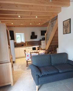 Χώρος καθιστικού στο Aux 43 arbres Gîte Tilleul