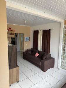 Ruang duduk di Casa com piscina em Guaratuba