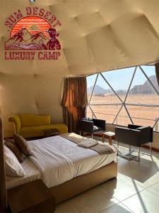 Φωτογραφία από το άλμπουμ του DESERT LUXURY CAMp & BUBBLES ROOM σε Ουάντι Ραμ +55 φωτογραφίες
