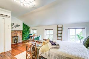 a bedroom with a bed and a fireplace at OLD TOWN Nature Oasis Block 2 King 99 Walk Score in Alexandria +60 photos