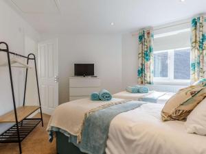 Voodi või voodid majutusasutuse 2 Bed in Porthtowan 86648 toas