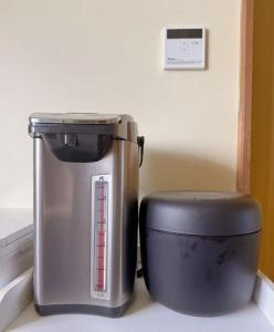 a toaster sitting on top of a kitchen counter at Hot Spring Guest House Mikunien - Vacation STAY 18629v in Sakai