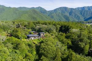 an aerial view of a house in the middle of a forest at Fujinomiya - House - Vacation STAY 20037 in Fujinomiya