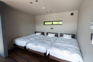 En eller flere senge i et værelse på Fujinomiya - House - Vacation STAY 20038