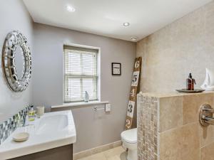 a bathroom with a sink and a toilet at 2 Bed in Nidderdale G0156 in Hampsthwaite +17 photos