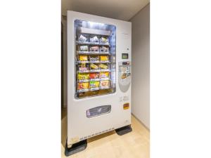 a white refrigerator in a room at Far East Village Hotel Tokyo Ariake - Vacation STAY 31648v in Tokyo