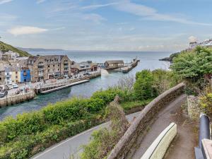 a view of a river with buildings and a city at 2 Bed in Looe 82537 in Looe