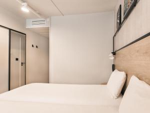 Postel nebo postele na pokoji v ubytování ibis Avignon Sud + 187 fotografií