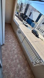 a view of a street from a window of a building at Catamarca Apart in Villa María