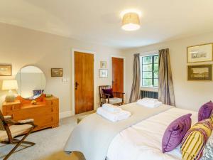 Ένα ή περισσότερα κρεβάτια σε δωμάτιο στο 6 bed in Keswick 89309