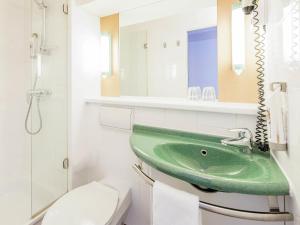 Phòng tắm tại ibis Paderborn City +35 ảnh