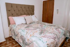 Un pat sau paturi într-o cameră la Casa Saye