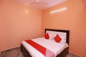 Ένα ή περισσότερα κρεβάτια σε δωμάτιο στο Hotel O Silverline Residency