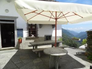 A patio or other outdoor area at Palazzo Gamboni Swiss Historic Hotel