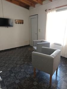 Un televizor și/sau centru de divertisment la El Coco +9 fotografii