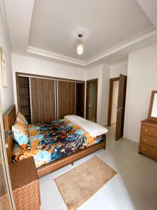 Ένα ή περισσότερα κρεβάτια σε δωμάτιο στο Sunny Surf House +25 φωτογραφίες