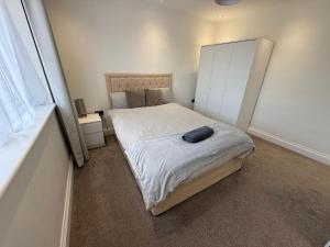 En eller flere senge i et værelse på 5 bedroom house in Orpington bromley