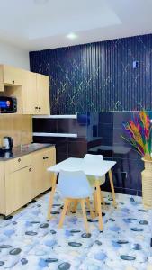 Φωτογραφία από το άλμπουμ του Amia Gold Luxury Apartments στην Αμπούζα