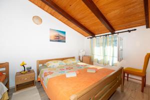 Katil atau katil-katil dalam bilik di Apartments with WiFi Silba - 17603