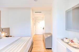 Postel nebo postele na pokoji v ubytování Mh Florence Hotel & Spa