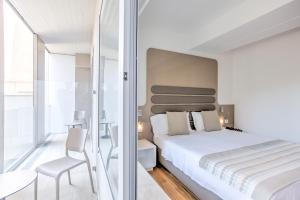 Postel nebo postele na pokoji v ubytování Mh Florence Hotel & Spa