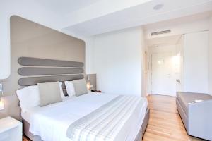 Postel nebo postele na pokoji v ubytování Mh Florence Hotel & Spa