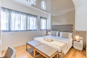 Postel nebo postele na pokoji v ubytování Mh Florence Hotel & Spa