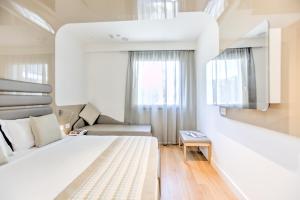 Postel nebo postele na pokoji v ubytování Mh Florence Hotel & Spa