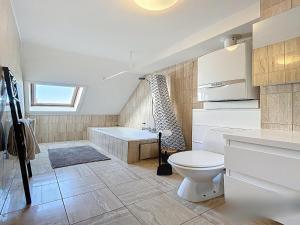 Koupelna v ubytování De Ster apartment for 6 people + 9 fotografií