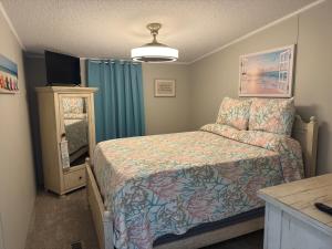 Ένα ή περισσότερα κρεβάτια σε δωμάτιο στο Holden Moore Beach House