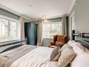 Postel nebo postele na pokoji v ubytování 9 Bed in Keswick SZ238