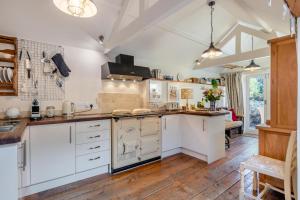 Kuchyň nebo kuchyňský kout v ubytování Tawny Cottage