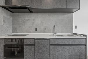 Η κουζίνα ή μικρή κουζίνα στο Mizuki Onsen Townhouses