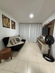 Et tv og/eller underholdning på Apartamento mobiliado a beira mar!