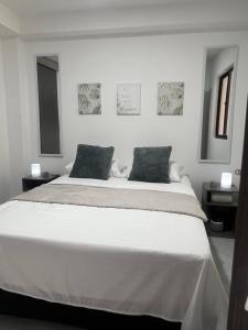 Ένα ή περισσότερα κρεβάτια σε δωμάτιο στο Apartamento en la América