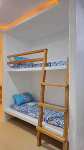 Ένα ή περισσότερα κρεβάτια σε δωμάτιο στο EuFil Siargao +20 φωτογραφίες