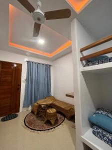 Ένα ή περισσότερα κρεβάτια σε δωμάτιο στο EuFil Siargao