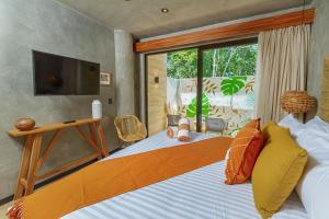 Televisyen dan/atau pusat hiburan di Arte en Estudio Tuk Tulum I