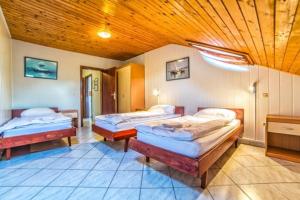 Postel nebo postele na pokoji v ubytování Villa Paolija + 37 fotografií
