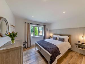Ένα ή περισσότερα κρεβάτια σε δωμάτιο στο 3 Bed in Ruthin 88123