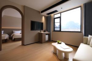 Φωτογραφία από το άλμπουμ του Yangshuo West Street Yunpuyun Mountain View Hotel σε Yangshuo