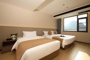 Φωτογραφία από το άλμπουμ του Yangshuo West Street Yunpuyun Mountain View Hotel σε Yangshuo