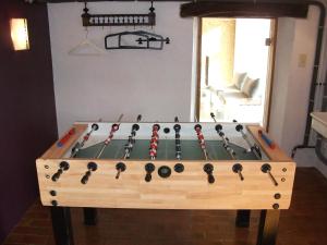 a game of snooker in a living room at Holiday Home with Sauna in Sourbrodt in Waimes