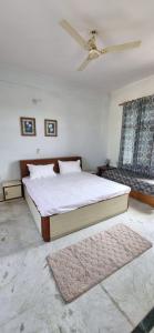 Postel nebo postele na pokoji v ubytování Farmstay near Corbett