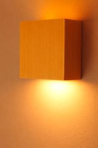 a lamp on a wall in a room at Hotel Amanek Ginza East in Tokyo